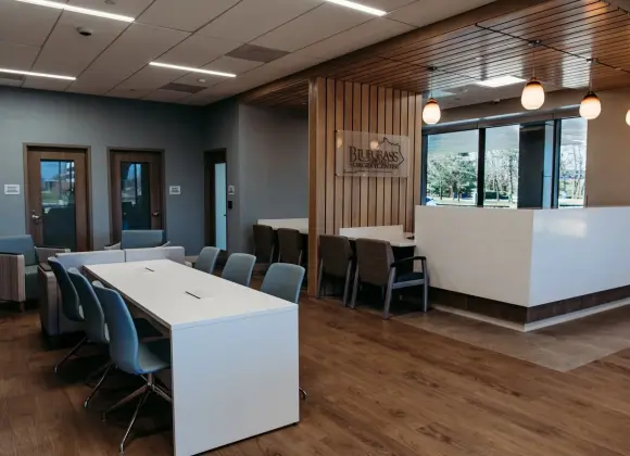 BGO empty meeting room with logo on the wall